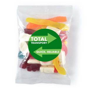 A clear cello bag filled with assorted colorful gummy lollies, featuring various shapes and textures.