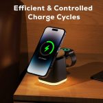 A magnetic wireless charger in black with a green light indicator, designed for phones and smartwatches.