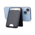 A black magnetic card wallet attached to a smartphone, serving as a wireless charging stand.