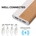 A wireless eco power bank with a speckled white body and a cork accent, featuring USB and USB-C ports.