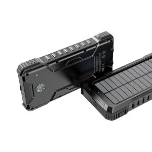 A black solar power bank with multiple USB ports and a textured surface, featuring a logo.