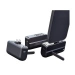 A black Genoa Capsule Power Bank Stand with a foldable support and multiple ports for charging devices.