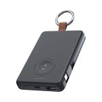 A black magnetic power bank with a keyring attachment, featuring a USB port and charging indicators.