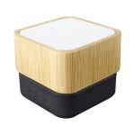 A square wireless speaker with a bamboo exterior and a black base, featuring a mesh speaker grille on top.