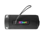 A black wireless speaker with a textured surface and a carrying strap, featuring a branding logo.