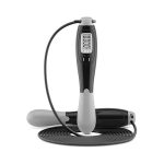 A digital skipping rope in black and grey, featuring a handle with a display and a long rope coiled beside it.