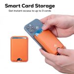 An orange magnetic card wallet stand attached to a smartphone, holding three cards. It features a branding logo.