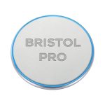 A round, light grey wireless charger with a blue edge and a logo on the surface.