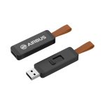 A black USB flash drive with a brown strap, featuring a logo on one side.