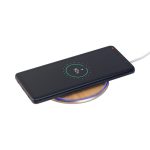 A bamboo wireless charger with a smartphone placed on top, featuring a circular LED light around the base.