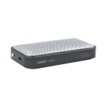 A sleek black Nano Vegan Wireless Speaker with a silver mesh top, featuring a logo and a charging port.