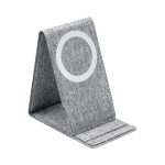A grey wireless charger with a textured fabric design and a circular charging pad.