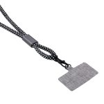 A black and white patterned wristband eco phone strap with a clip and a textured grey tag.