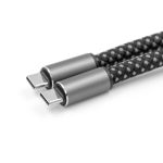 A black and silver braided charging cable with two USB-C connectors on each end. It features a sleek design and textured finish.