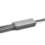 A charging cable in grey and black with a textured braided design and a metallic connector.