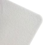A white desk mat with a soft texture and rounded corners for an office or business setting.