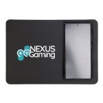 A wireless charger and mouse pad featuring the Nexus Gaming logo, with a smartphone placed on the charging area.