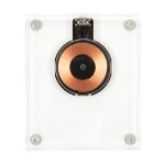 A crystal wireless charger with a clear casing and a circular copper charging pad in the centre.