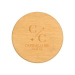 A round bamboo coaster featuring a logo and text for "Capital Core Hotel". The surface is smooth and natural in texture.