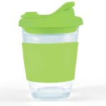 A reusable coffee cup with a clear body and a vibrant green silicone sleeve and snap lid.
