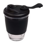 A reusable coffee cup with a transparent glass body and a black silicone sleeve and lid.