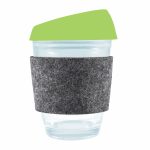 A reusable coffee cup featuring a clear design, a green silicone lid, and a gray felt band for grip.