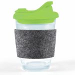 A reusable coffee cup with a transparent body, green snap lid, and a gray RPET band for grip.
