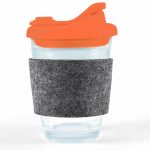 A reusable coffee cup featuring a clear glass body, an orange snap lid, and a gray RPET band for insulation.