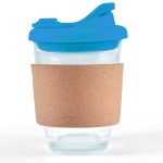 A reusable coffee cup with a clear body, blue snap lid, and a cork band for grip.