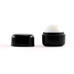 A black cube lip balm container with a white lip balm sphere on top, featuring a removable lid.