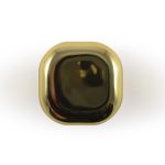 A gold-colored cube of Ritz Cube Lip Balm, featuring a sleek and shiny surface.