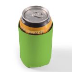 A drink can is nestled inside a bright green stubby cooler designed to keep beverages cold.