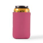 A drink bottle cooler in bright pink material, designed to fit a standard can.