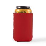 A drink can is snugly fitted inside a vibrant red stubby cooler, designed to keep beverages cold.