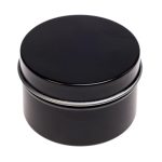 A black tin candle container with a smooth, rounded lid, designed for holding a petite candle.