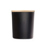 A large black glass candle with a natural wood lid. The candle features a sleek, modern design.