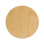 A round bamboo lid for a candle, featuring a smooth surface and natural finish.