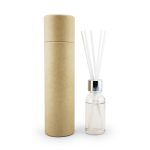 A clear glass reed diffuser bottle with a silver cap and white reeds, packaged in a brown cylindrical box.