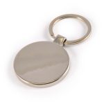 A circular zinc keytag with a shiny metallic finish and a metal keyring attached.