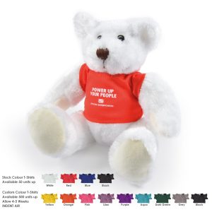 A plush teddy bear in white with a red T-shirt, featuring a logo. Various other T-shirt colours are displayed nearby.