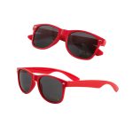 Red sunglasses with dark lenses, featuring a classic design and a small logo on the side.