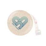 A round, beige tape measure with a retractable mechanism and a logo in blue and green.