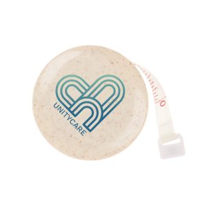 A round, beige tape measure with a retractable mechanism and a logo in blue and green.