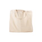 A cream-colored reusable calico bag with a short handle and no visible text or logos.