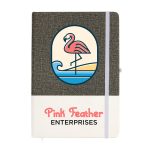 A grey and cream A5 notebook with a decorative flamingo design and a branded logo.