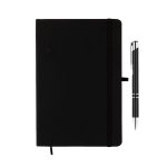 A black notebook with an elastic band and a silver Napier pen positioned beside it. The notebook has a logo.