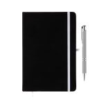 A black notebook with a white elastic band and a silver pen placed beside it. The notebook features a logo.