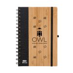 A bamboo notebook with a spiral binding, featuring a logo and design elements in black.