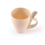 A reusable coffee cup made from wheat fiber, featuring a light beige color and a spoon integrated into the handle.