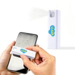 A white spray bottle for cleaning screens, being used on a smartphone, with a logo visible on the bottle.